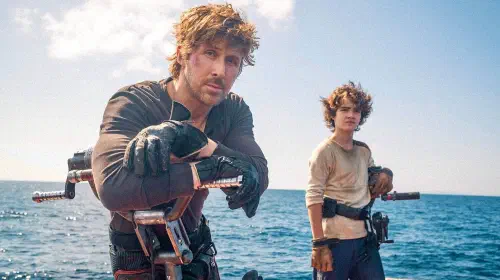 assets/ryan-gosling-and-flynn-gray-in-star-wars-starfighter.jpeg