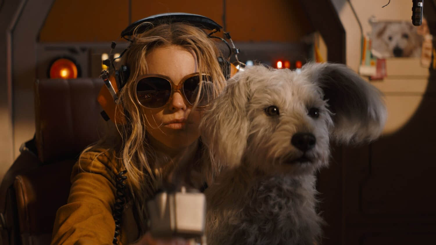 kara-wearing-sunglasses-while-krypto-sits-on-her-lap-in-supergirl.jpeg