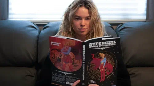 assets/milly-alcock-holding-supergirl-woman-of-tomorrow.jpeg