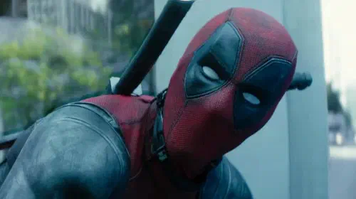 assets/ryan-reynolds-in-the-suit-in-deadpool-2.jpeg
