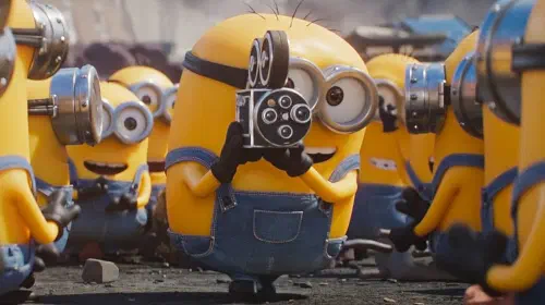 assets/a-minion-holding-a-camera-in-minions-and-monsters.jpeg