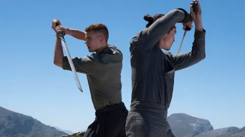 assets/rand-and-lan-practicing-swordfighting-in-the-wheel-of-time-season-3.jpeg