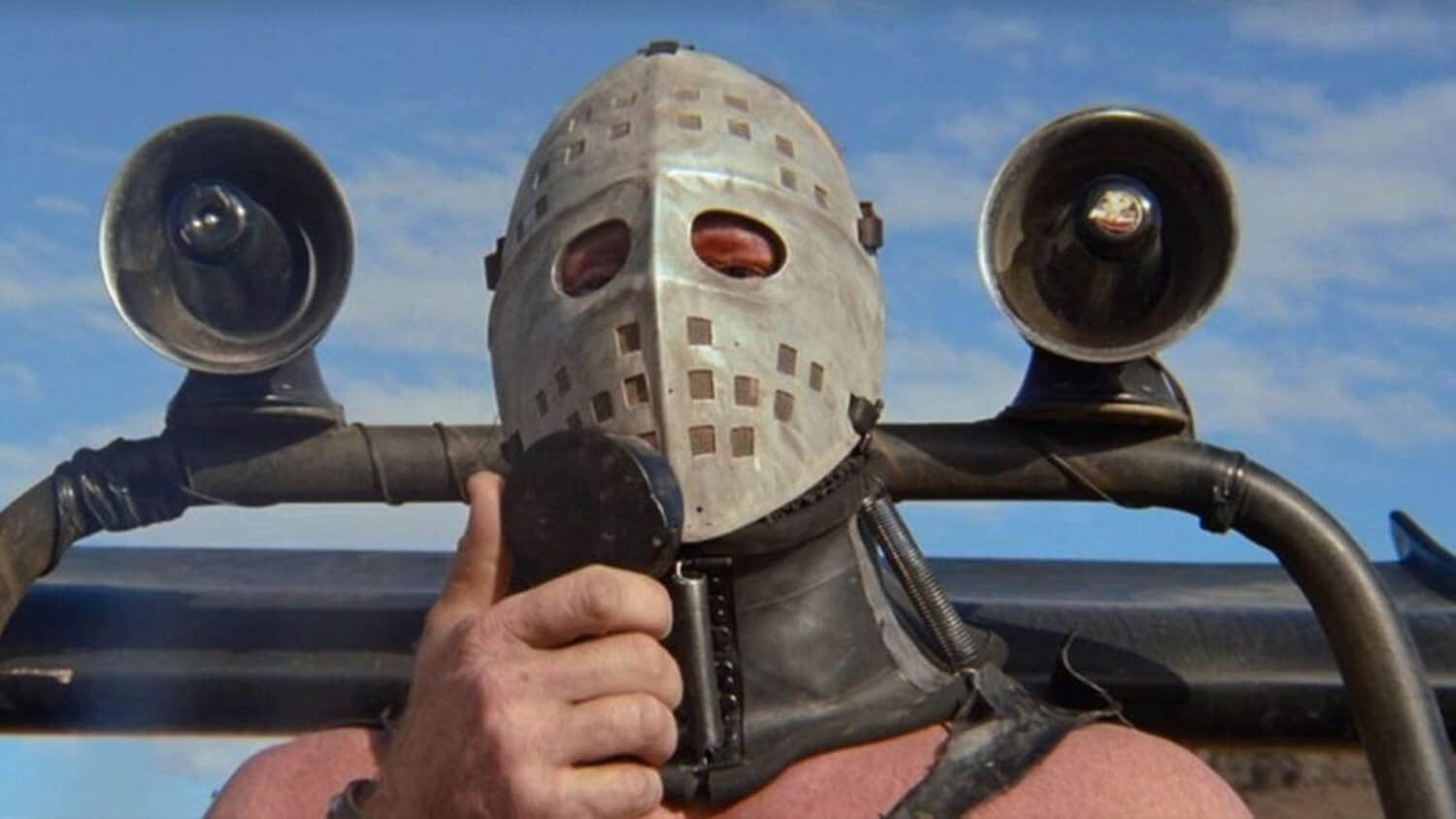 lord-humungus-talking-into-a-megaphone-in-mad-max-2-the-road-warrior-1.jpeg