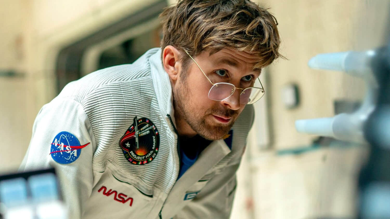 ryan-gosling-as-ryland-grace-leaning-forward-in-project-hail-mary.jpeg