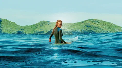 assets/blake-lively-as-nancy-adams-on-her-surfboard-in-the-shallows.jpeg