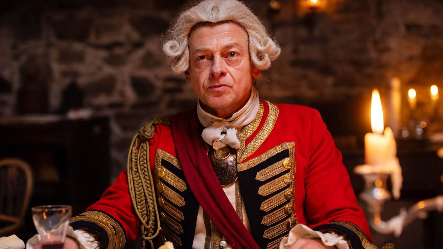 andy-serkis-as-edward-braddock-sitting-in-young-washington.jpeg