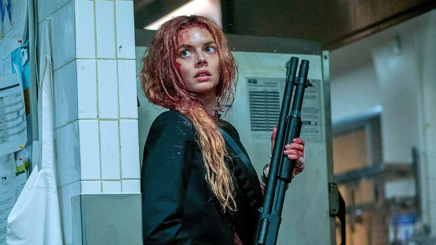 samara-weaving-holding-a-shotgun-as-grace-in-ready-or-not-2-here-i-come.jpeg