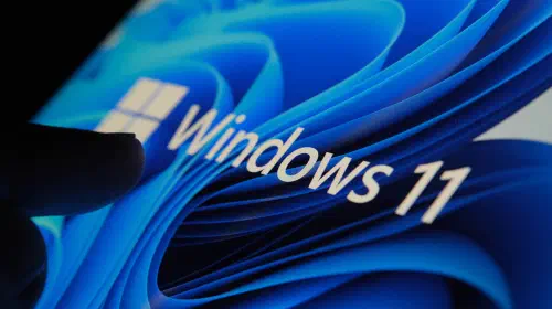 assets/Finger-touching-Windows-11-logo-on-screen-in-dark-room-2.jpeg