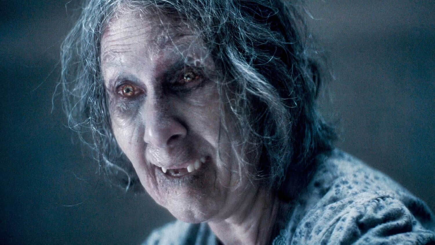 a-grandma-smiling-in-evil-dead-burn.jpeg