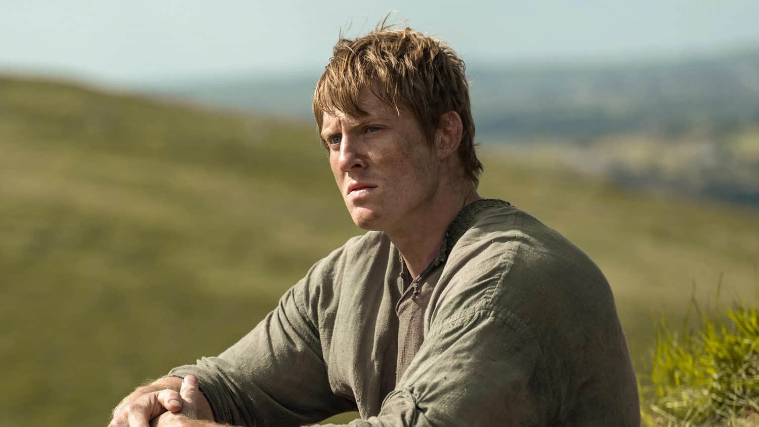 dunk-sitting-in-a-field-in-a-knight-of-the-seven-kingdoms.jpeg