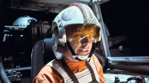 assets/luke-skywalker-smiling-while-piloting-an-x-wing-in-star-wars-a-new-hope.jpeg