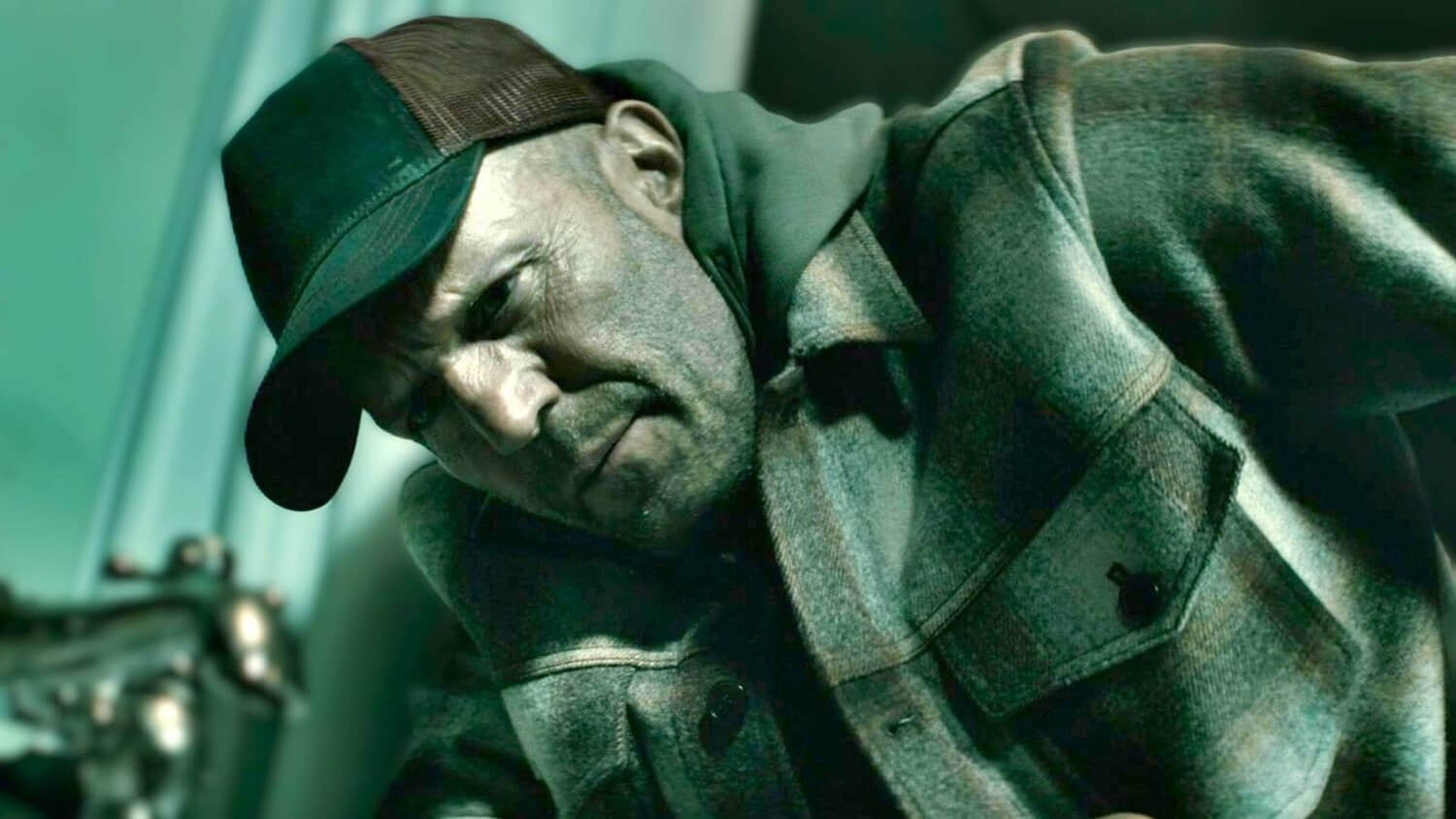 statham-wearing-a-hat-in-a-working-man.jpeg