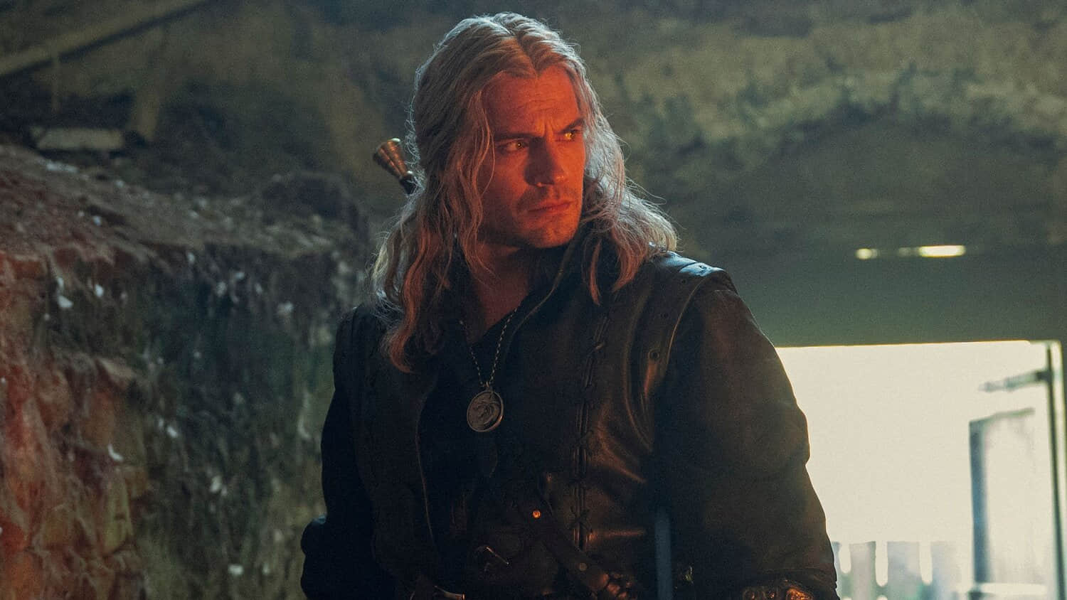henry-cavill-as-geralt-of-rivia-in-a-cave-in-the-witcher-season-3.jpeg