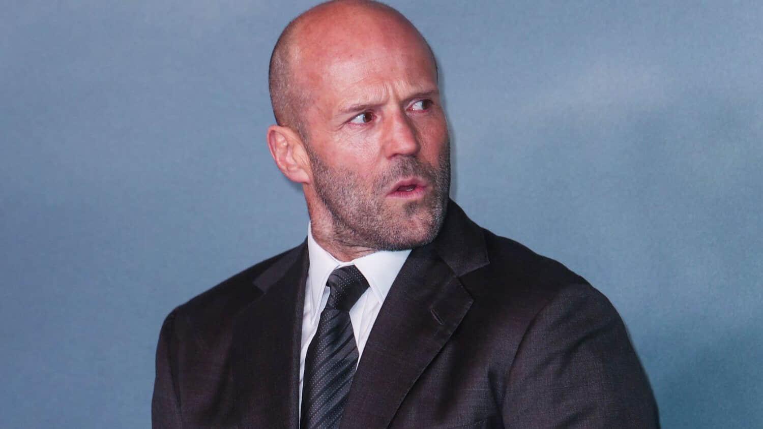 jason-statham-looking-suspicious-on-the-red-carpet-for-shelter.jpeg