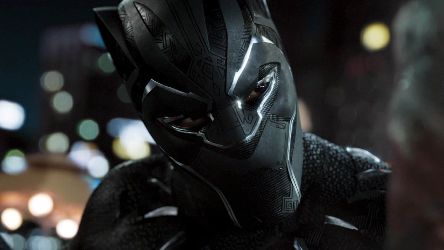 chadwick-boseman-s-black-panther-about-to-attack-a-man-in-black-panther-2018.jpeg