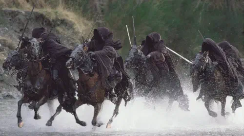 assets/the-nazgul-riding-horses-through-water-in-the-lord-of-the-rings.jpeg