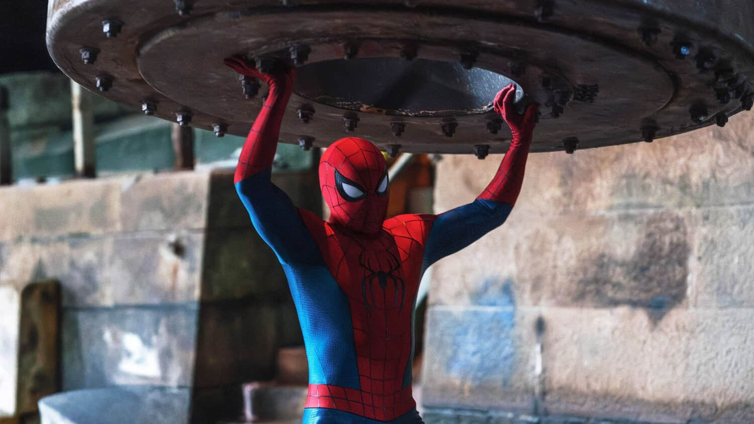 spider-man-holding-up-a-large-piece-of-metal-in-brand-new-day.jpeg