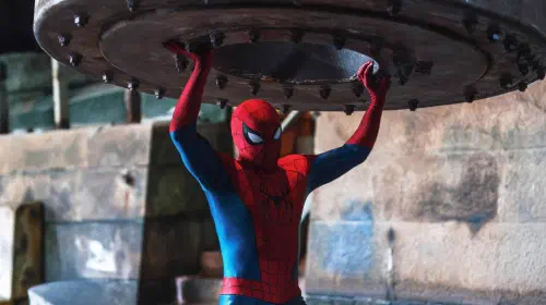 assets/spider-man-holding-up-a-large-piece-of-metal-in-brand-new-day.jpeg