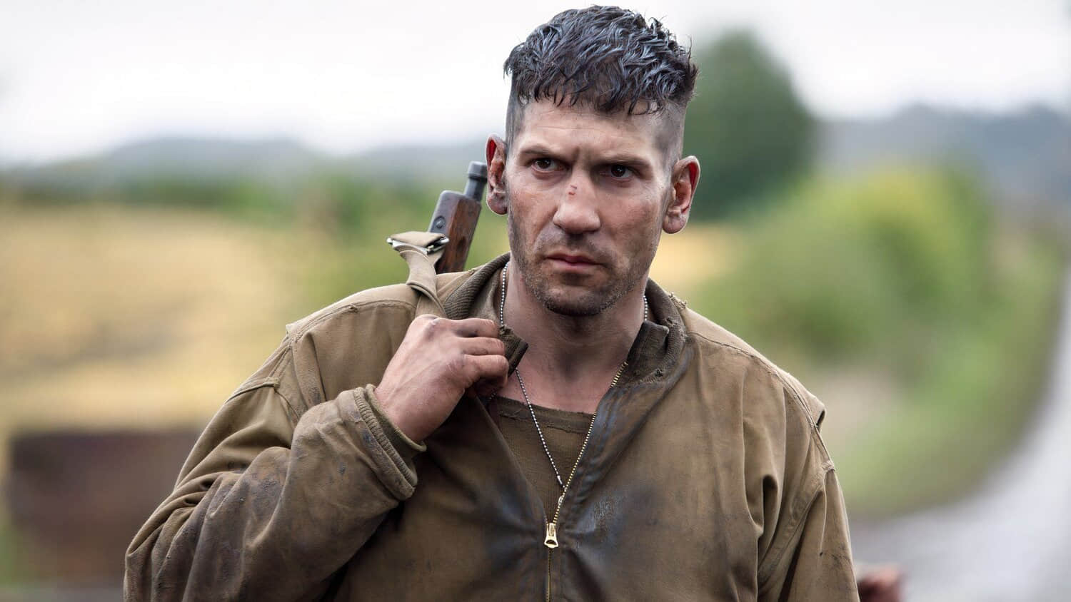 jon-bernthal-with-a-machine-gun-slung-on-his-shoulder-in-fury-2014.jpeg