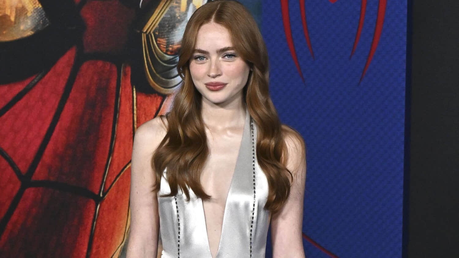 sadie-sink-posing-in-front-of-the-spider-man-brand-new-day-poster.jpeg