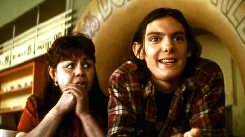 assets/lukas-haas-and-zelda-rubinstein-in-mars-attacks.jpeg
