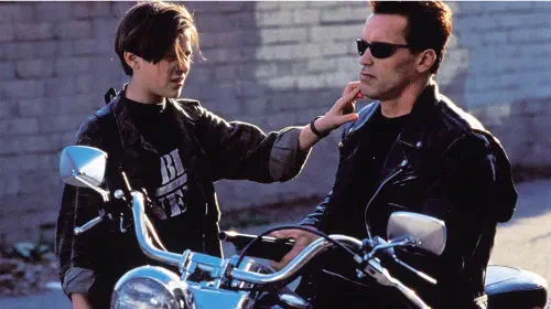 assets/anrold-schwarzenegger-and-edward-furlong-in-terminator-2.jpeg