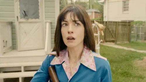 assets/anne-hathaway-looking-shocked-in-the-end-of-oak-street.jpeg