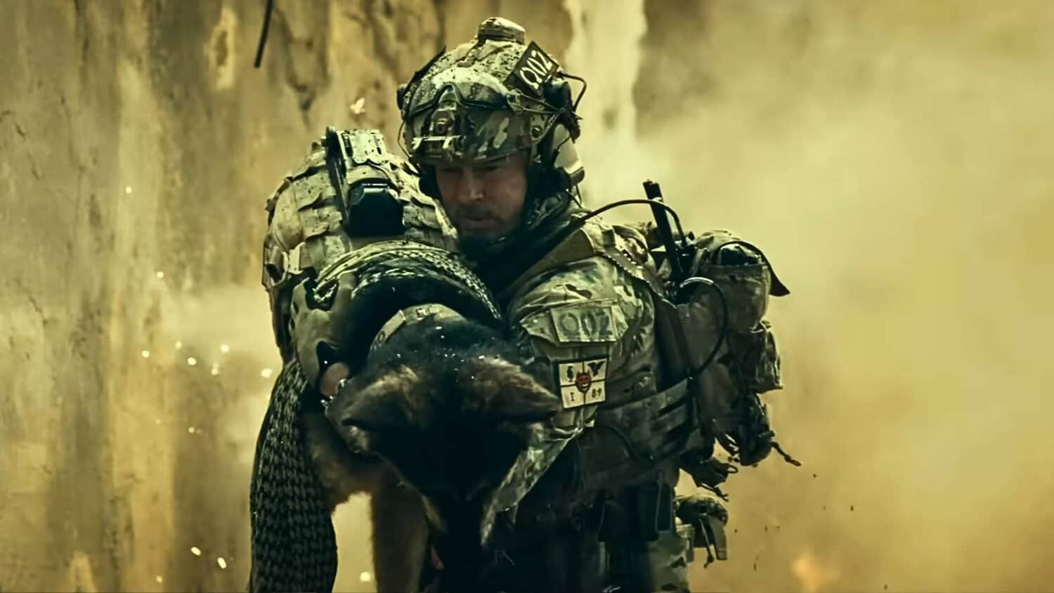 brad-pitt-holding-dog-in-heart-of-the-beast.jpeg
