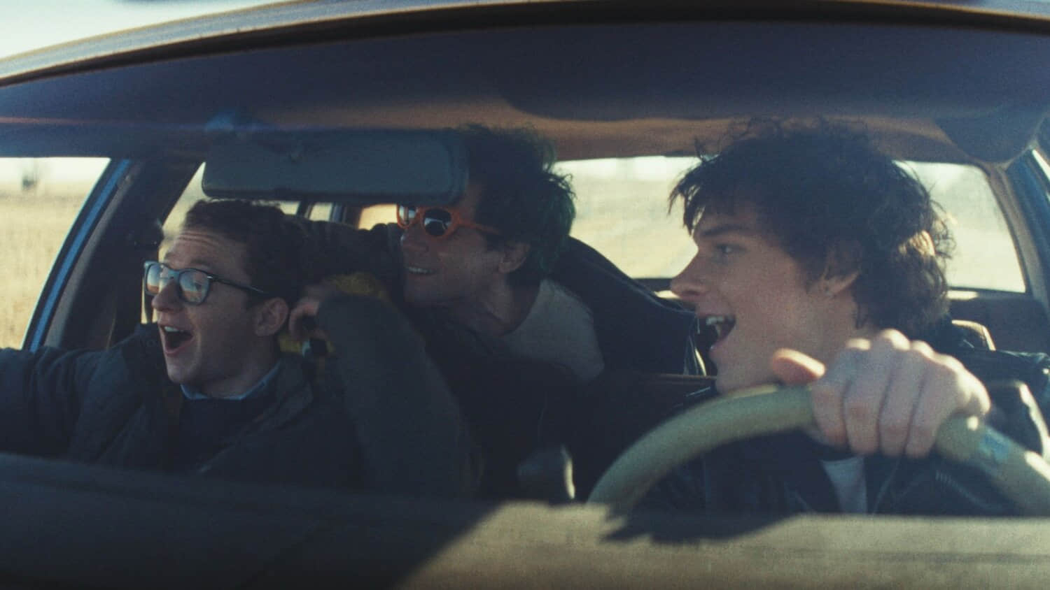tommy-fred-and-chad-laughing-together-in-a-car-in-nimrods.jpeg