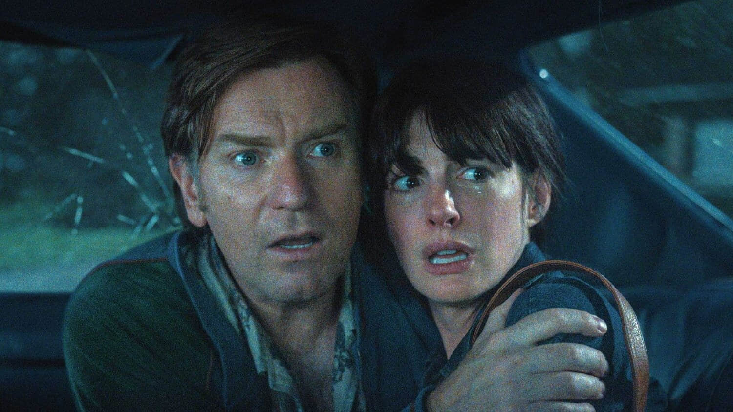 ewan-mcgregor-and-anne-hathaway-looking-scared-in-the-end-of-oak-street.jpeg