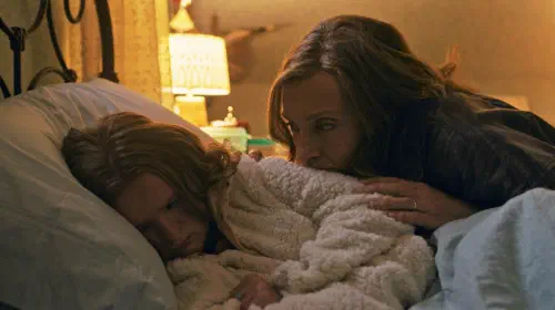 assets/milly-shapiro-and-toni-collette-in-hereditary.jpeg