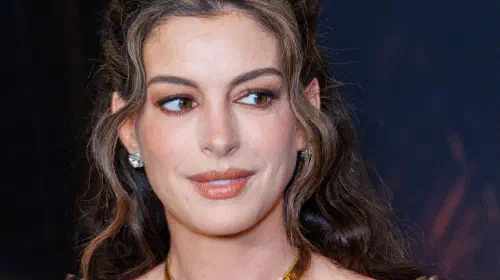 assets/a-close-up-of-anne-hathaway-on-a-red-carpet.jpeg