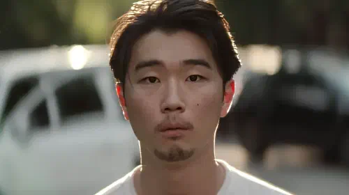 assets/james-staring-forlornly-into-camera-in-it-ends.jpeg