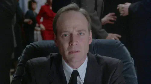 assets/a-man-looks-at-the-camera-in-the-sixth-sense.jpeg
