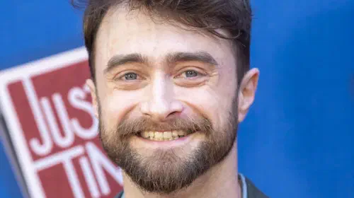 assets/daniel-radcliffe-smiling-at-new-york-broadway-opening-night-of-just-in-time.jpeg