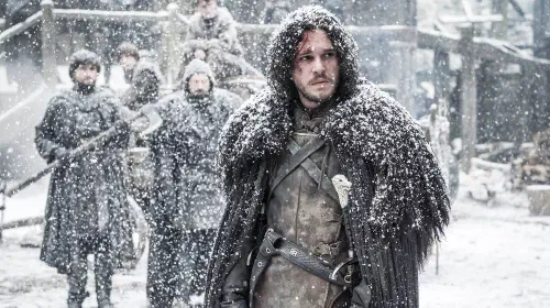 assets/jon-snow-standing-in-castle-black-in-game-of-thrones.jpeg