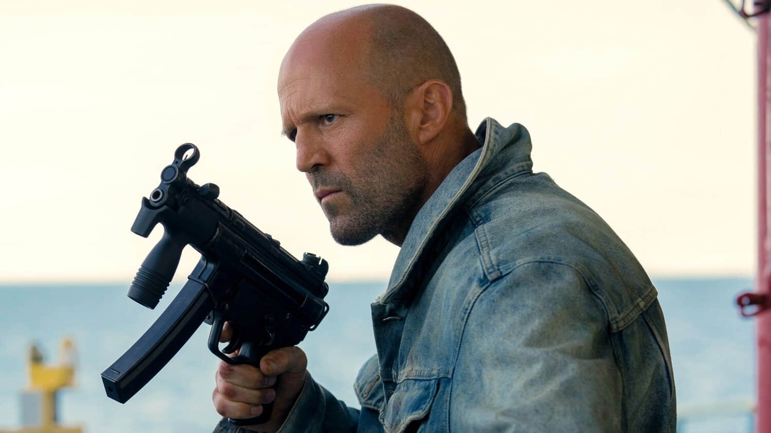 jason-statham-holding-a-gun-in-mutiny.jpeg