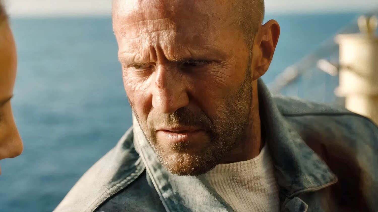 jason-statham-talking-to-someone-in-mutiny.jpeg