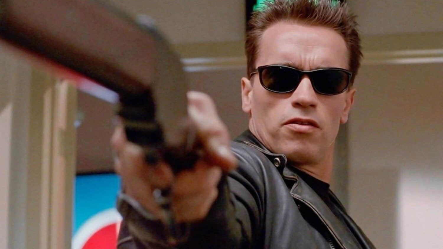 arnold-schwarzenegger-as-the-terminator-with-a-gun.jpeg