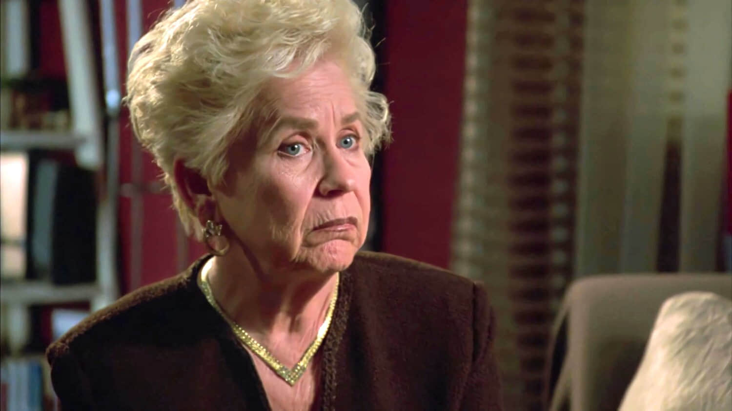 carolyn-minnott-s-claudette-looking-slightly-surprised-in-the-room.jpeg