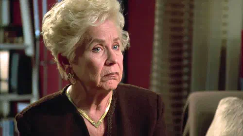 assets/carolyn-minnott-s-claudette-looking-slightly-surprised-in-the-room.jpeg