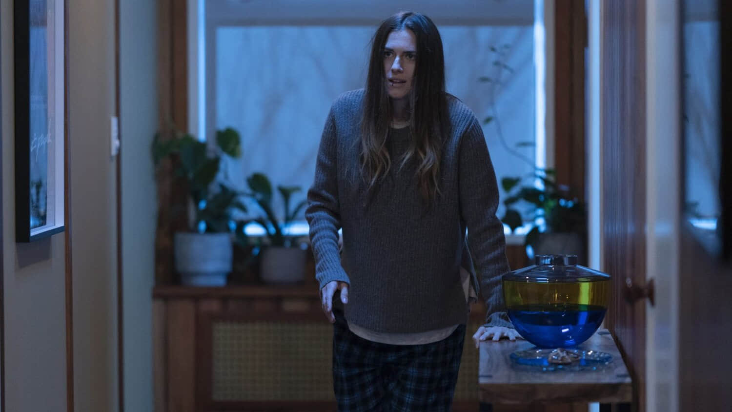 allison-williams-walking-down-a-hallway-in-m3gan.jpeg