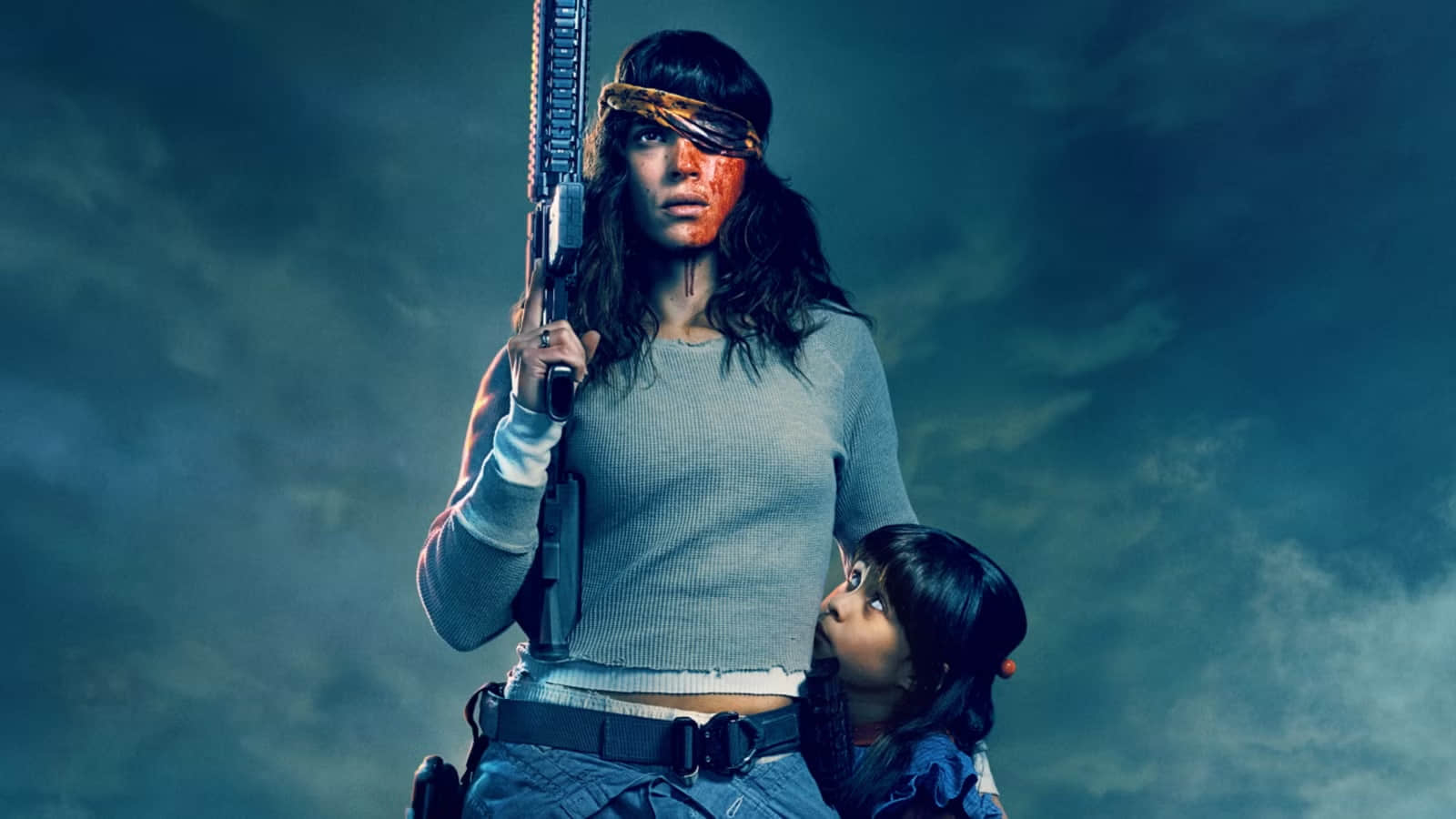 adria-arjona-as-celeste-wearing-an-eyepatch-holding-a-gun-and-protecting-a-child-in-onslaught