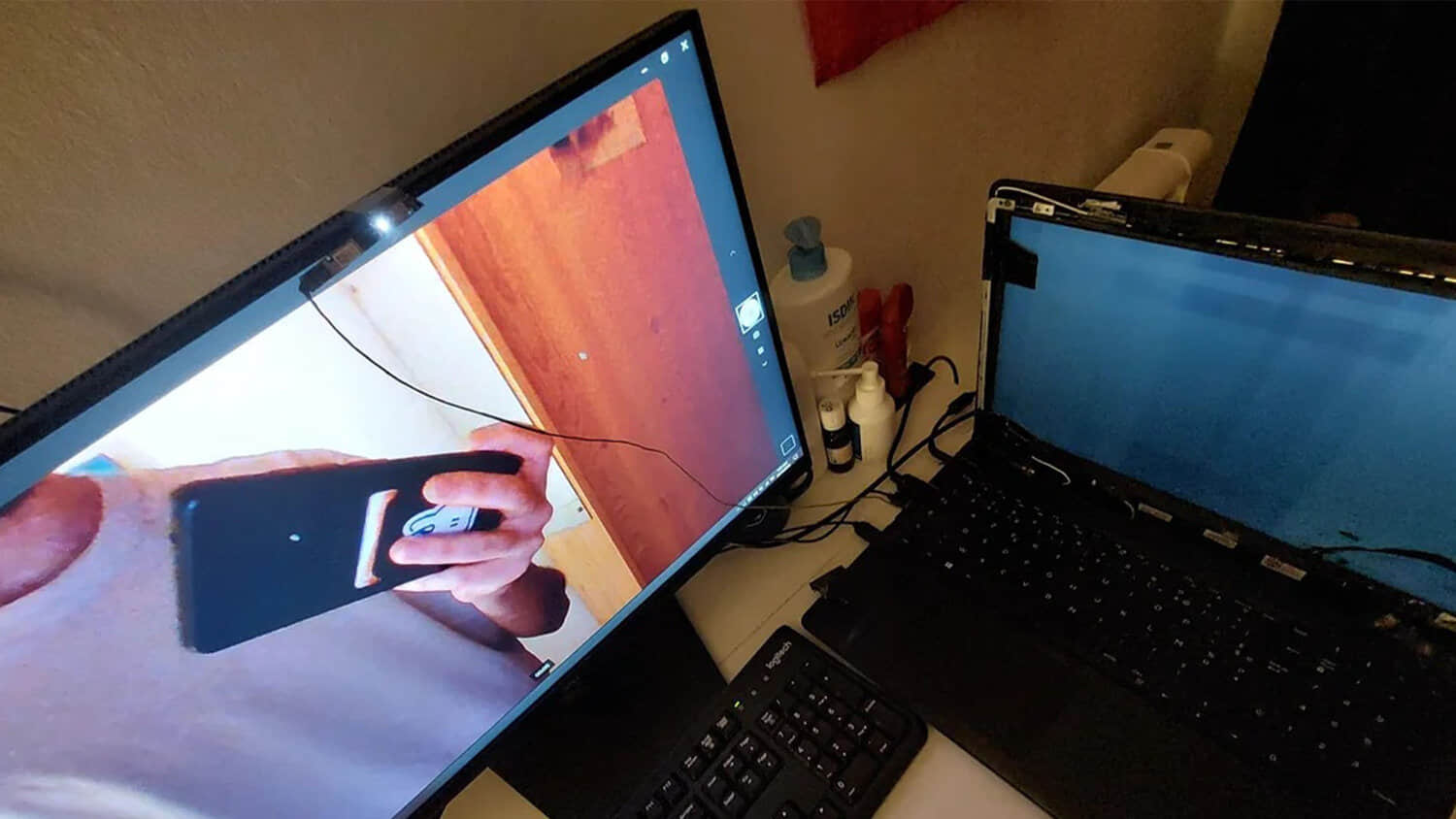 Broken-laptops-webcam-used-for-job-interviews-on-secondary-monitor.jpeg