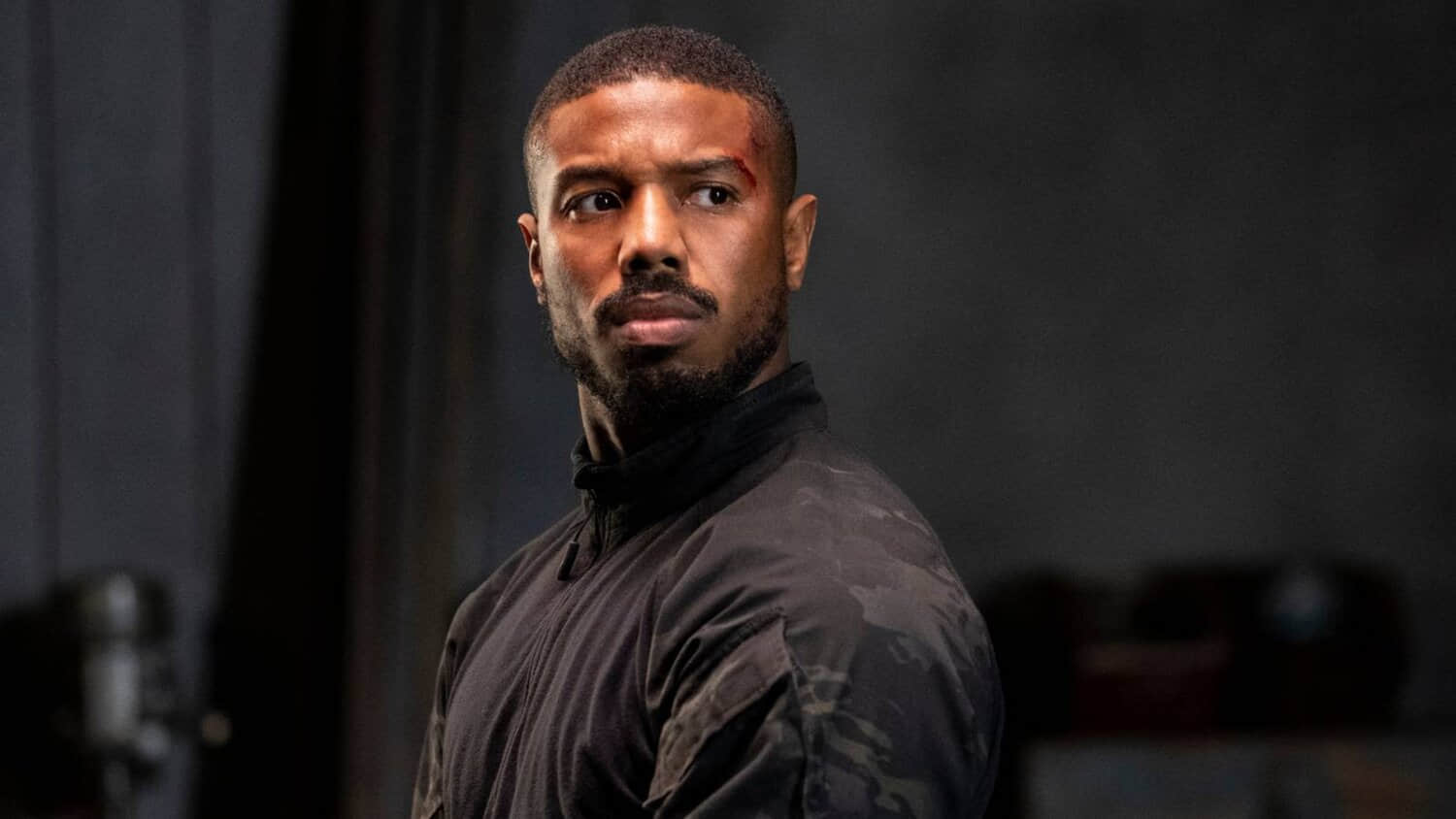michael-b-jordan-looking-over-his-shoulder-in-without-remorse.jpeg