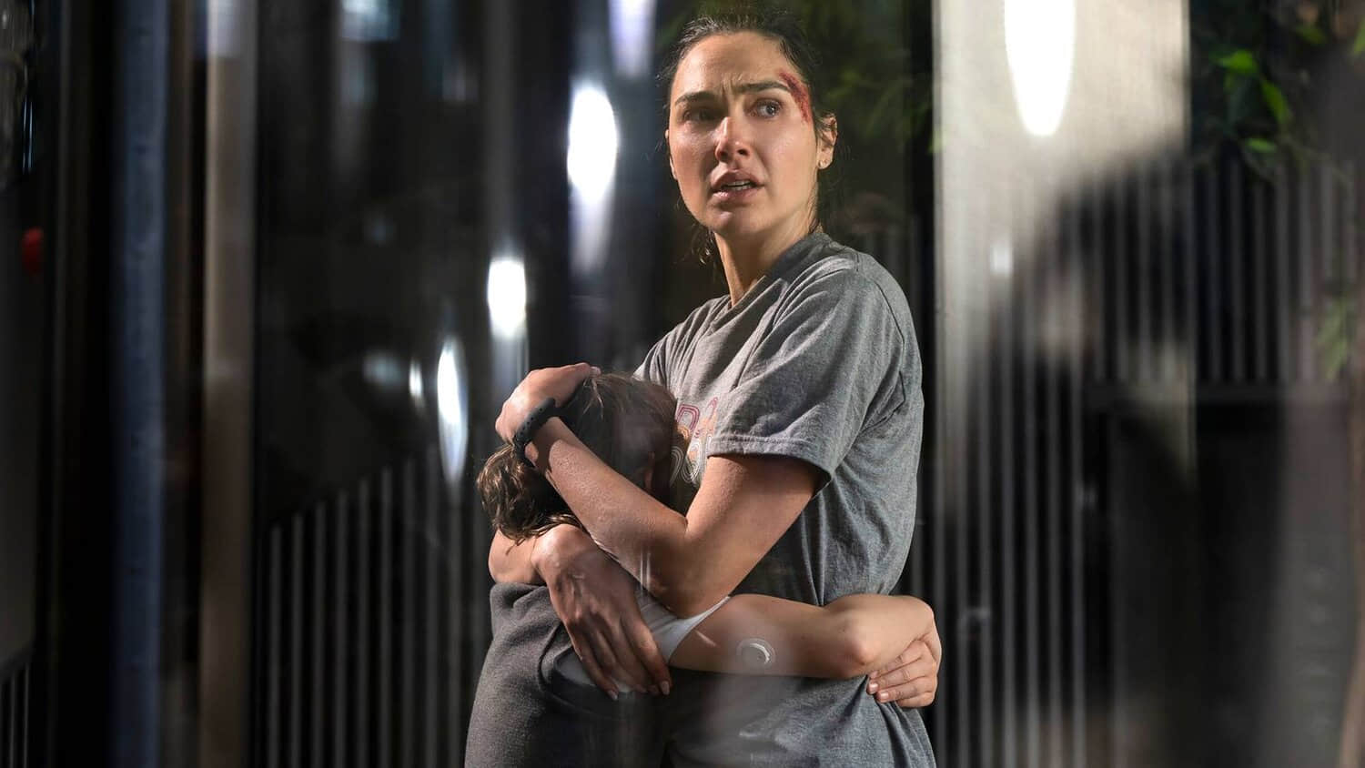 gal-gadot-s-maia-hugging-her-son-and-looking-worried-in-the-runner.jpeg