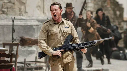 assets/a-soldier-holds-a-machine-gun-in-sas-rogue-heroes.jpeg