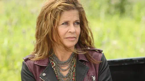assets/linda-hamilton-sitting-outside-in-lost-girl.jpeg