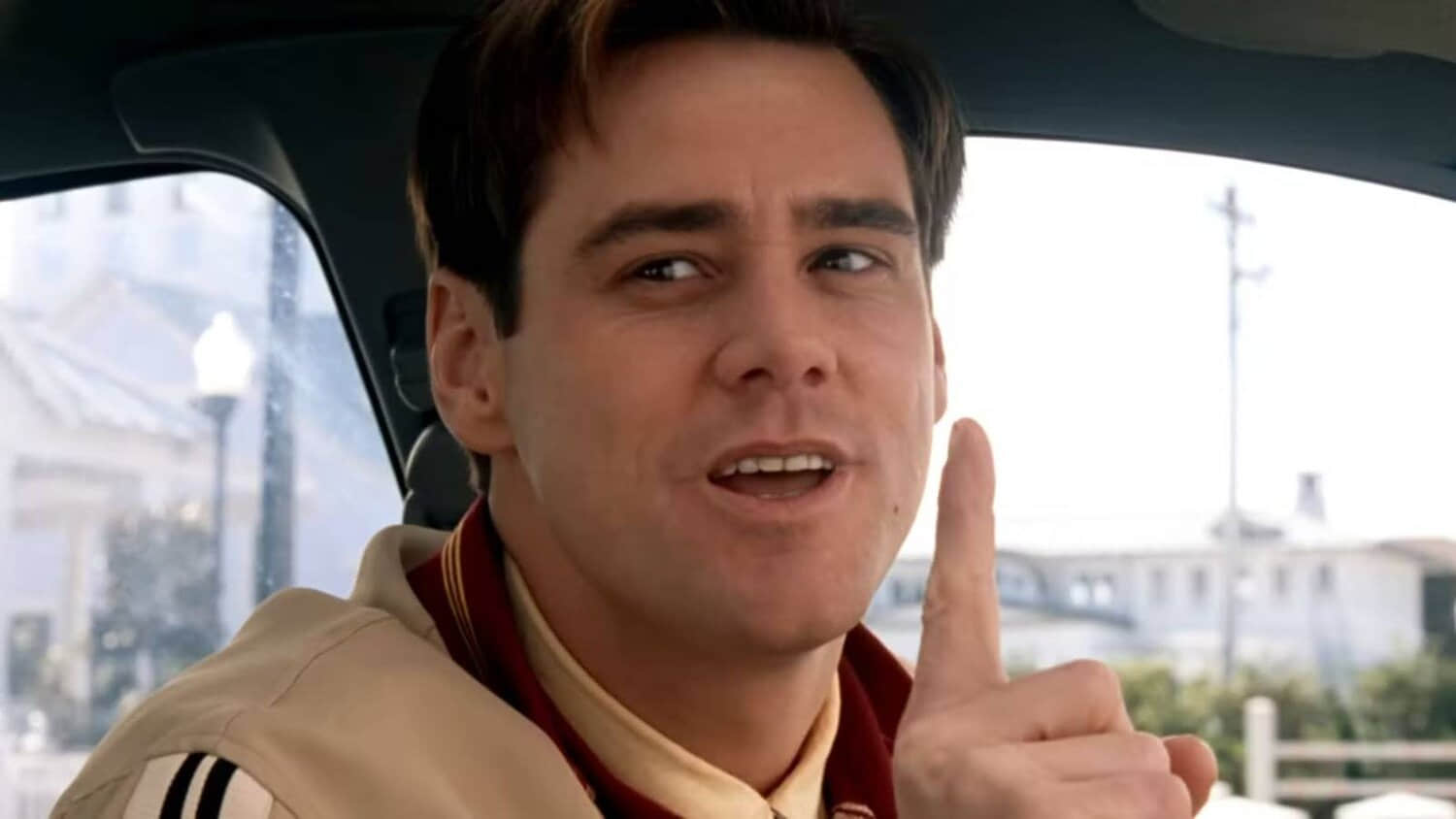 jim-carrey-as-truman-holding-up-a-finger-in-the-truman-show.jpeg