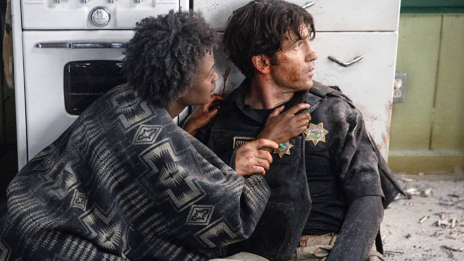 jon-bernthal-bloody-in-those-who-wish-me-dead-with-a-woman-touching-him.jpeg